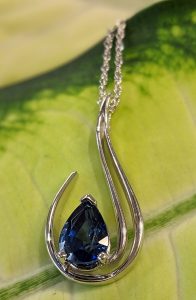 Pear Shaped Sapphire Pendant on 14 Karat White Gold Chain